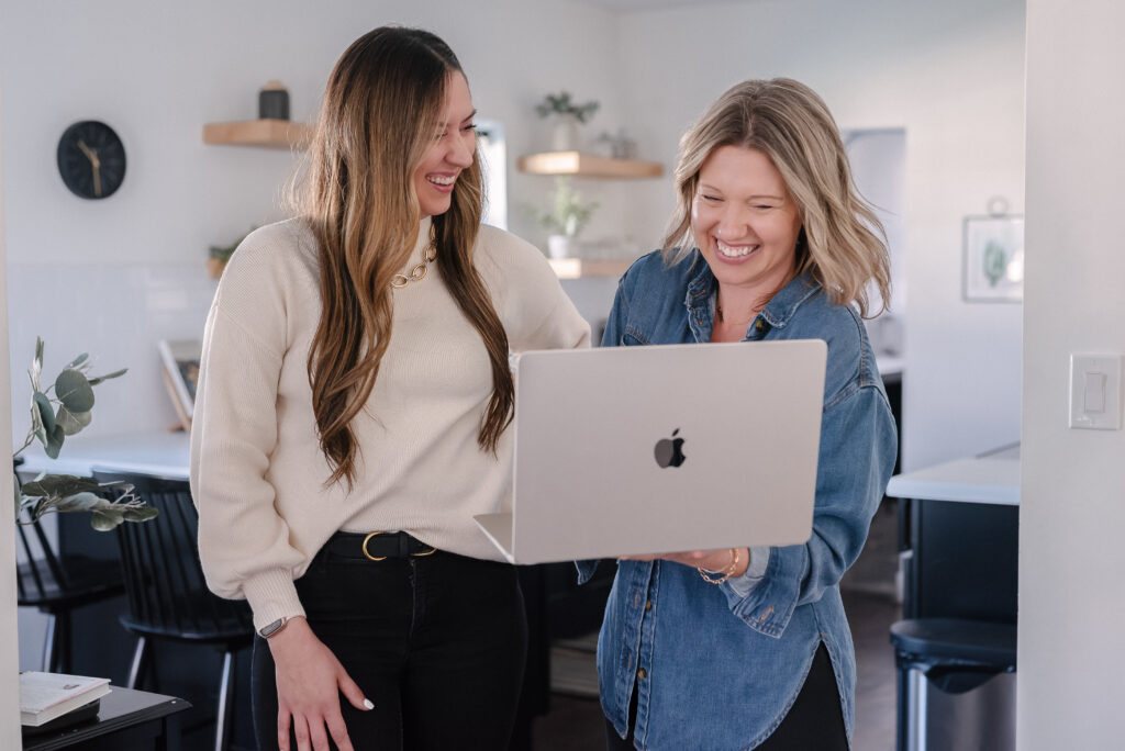 online business coach supporting woman entrepreneur in strategy session